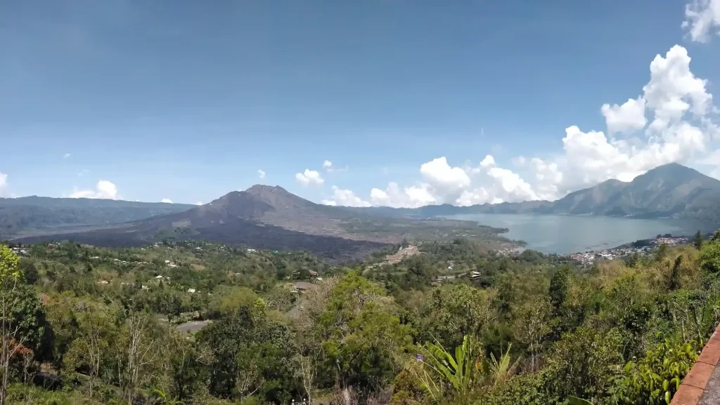 Mount Batur and Lake Batur seen across the Kintamani caldera, the volcanic highland where Bali's specialty arabica is grown